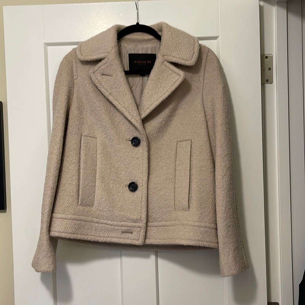 Coach waist length tweed jacket, wool blend, size small. Comes with storage bag.